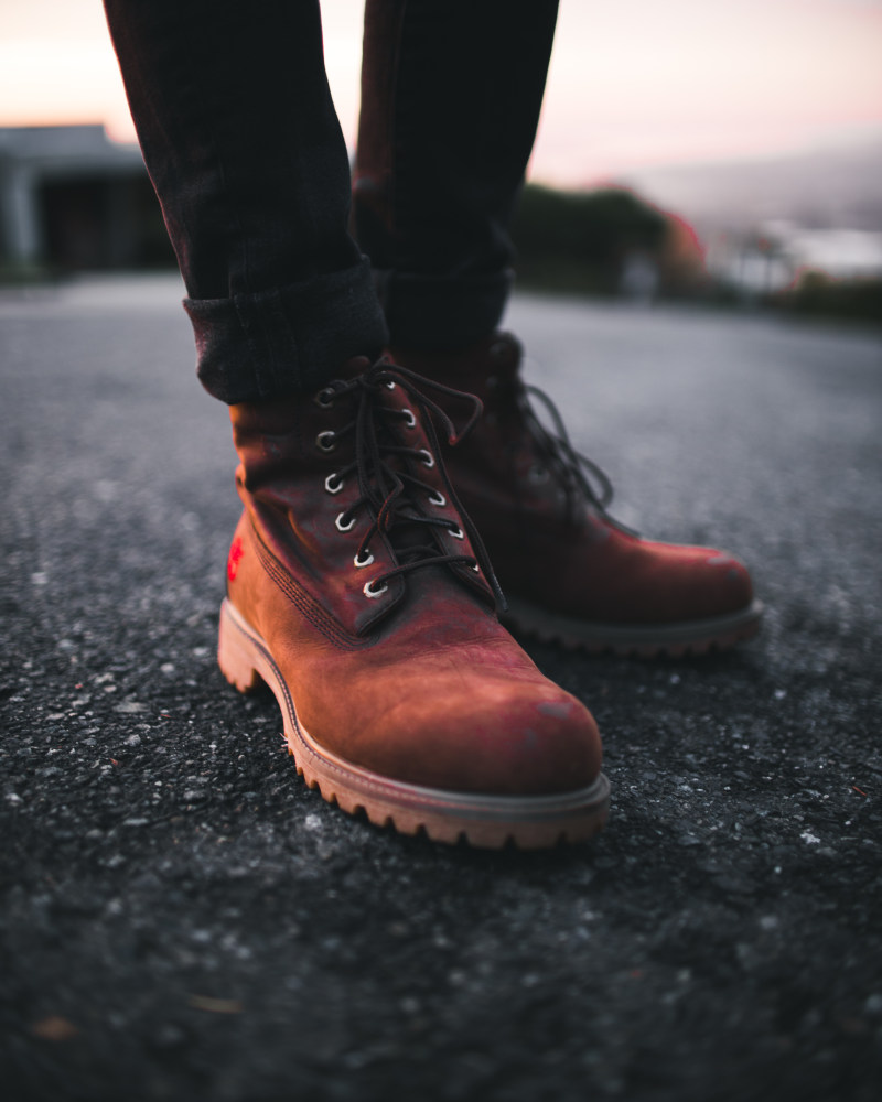 人穿着棕色Timberland工作靴和黑色牛仔布紧身牛仔裤站在柏油路Person Wearing Pair of Brown Timberland Work Boots and Black Denim Skinny Jeans Standing on Asphalt Road|adult,adventure,Blur,bokeh,boot,Brown,Classic,closeup,concrete,Fashion,feet,footwear,ground,Man,outdoors,pants,person,shoelaces,Shoes,sneakers,Street,timberland,walk,wear,人,冒险,地面,成人,户外,散景,时尚,林地,棕色,模糊,混凝土,特写,男人,穿,经典,脚,街道,裤子,走路,运动鞋,靴子,鞋子,鞋带,鞋类-海量高质量免版权图片素材-设计师素材-摄影图片-mitapix-美塔图像