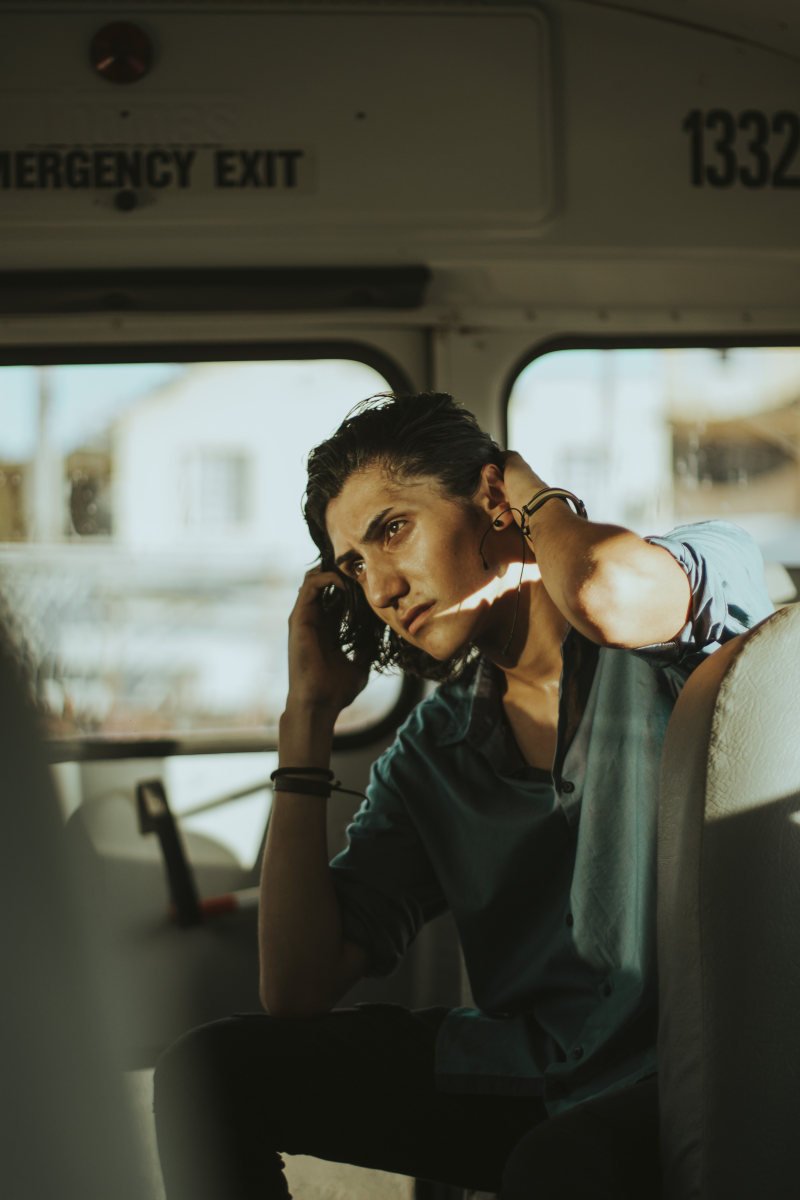 男人坐在按住他的头发Man Sitting While Holding His Hair|attractive,Blur,Daylight,depth of field,dress shirt,emergency exit,facial expression,Focus,goodlooking,guy,hairstyle,handsome,inside,long hair,looking away,male,Man,model,person,photoshoot,pose,posing,posture,sitting,transportation,transportation system,Travel,Vehicle,wear,人,发型,坐,好看,姿势,家伙,拍摄,旅行,日光,景深,有吸引力,构成,模型,模糊,焦点,男人,男性,看着别处,礼服衬衫,穿,紧急出口,英俊,车辆,运输,运输系统,里面,长长的头发,面部表情-海量高质量免版权图片素材-设计师素材-摄影图片-mitapix-美塔图像