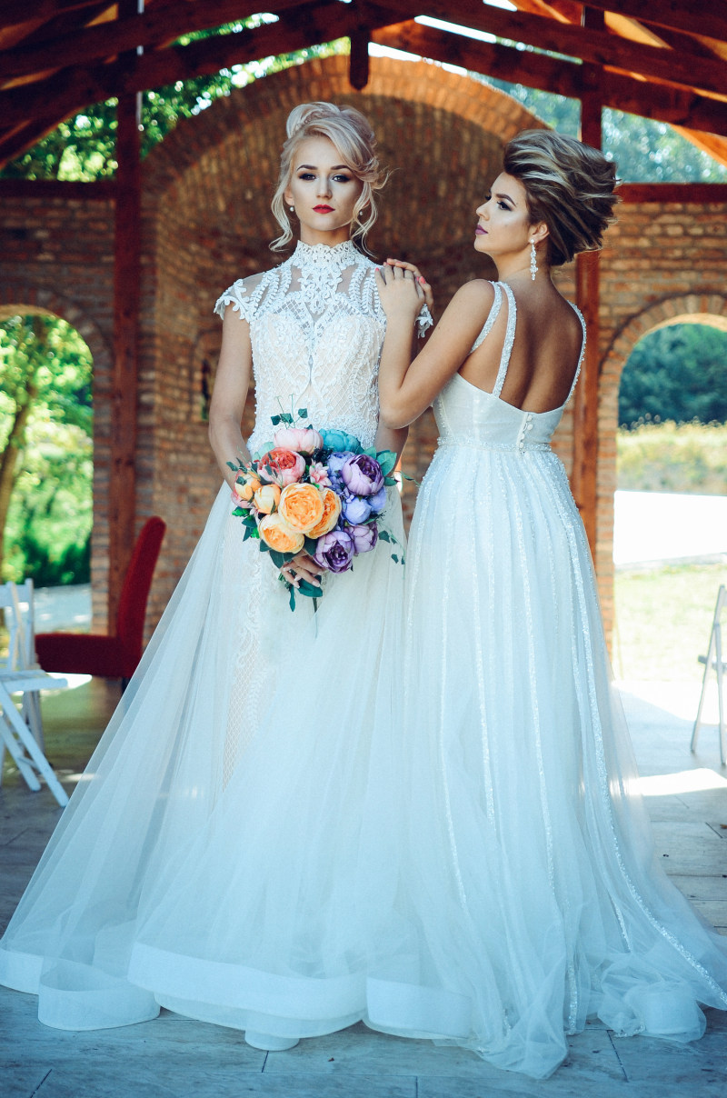 女人穿着白色蕾丝婚纱拿着花束在女人旁边白色礼服Woman in White Lace Wedding Dress Holding Flower Bouquet Beside Woman in White Dress|Beautiful,bouquet,bridal,bride,Close-up,daytime,dresses,elegant,faces,Fashion,female,female model,Flora,Flowers,girls,hair,hairstyle,Hands,make-up,model,models,outdoors,People,photoshoot,pose,pretty,wedding dress,women,Young,人民,优雅,化妆,发型,头发,女孩,女性,女模特,妇女,婚纱,年轻,户外,手,拍摄,新娘,时尚,构成,植物区系,模型,漂亮,白天,礼服,美丽,花束,面孔,鲜花-海量高质量免版权图片素材-设计师素材-摄影图片-mitapix-美塔图像